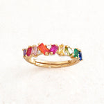 rainbow pride ring with collision design featuring stones with rainbow pride flag colours, straight on