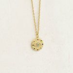Evil eye and rainbow themed necklace as part of pride jewelry collection - front gold shot