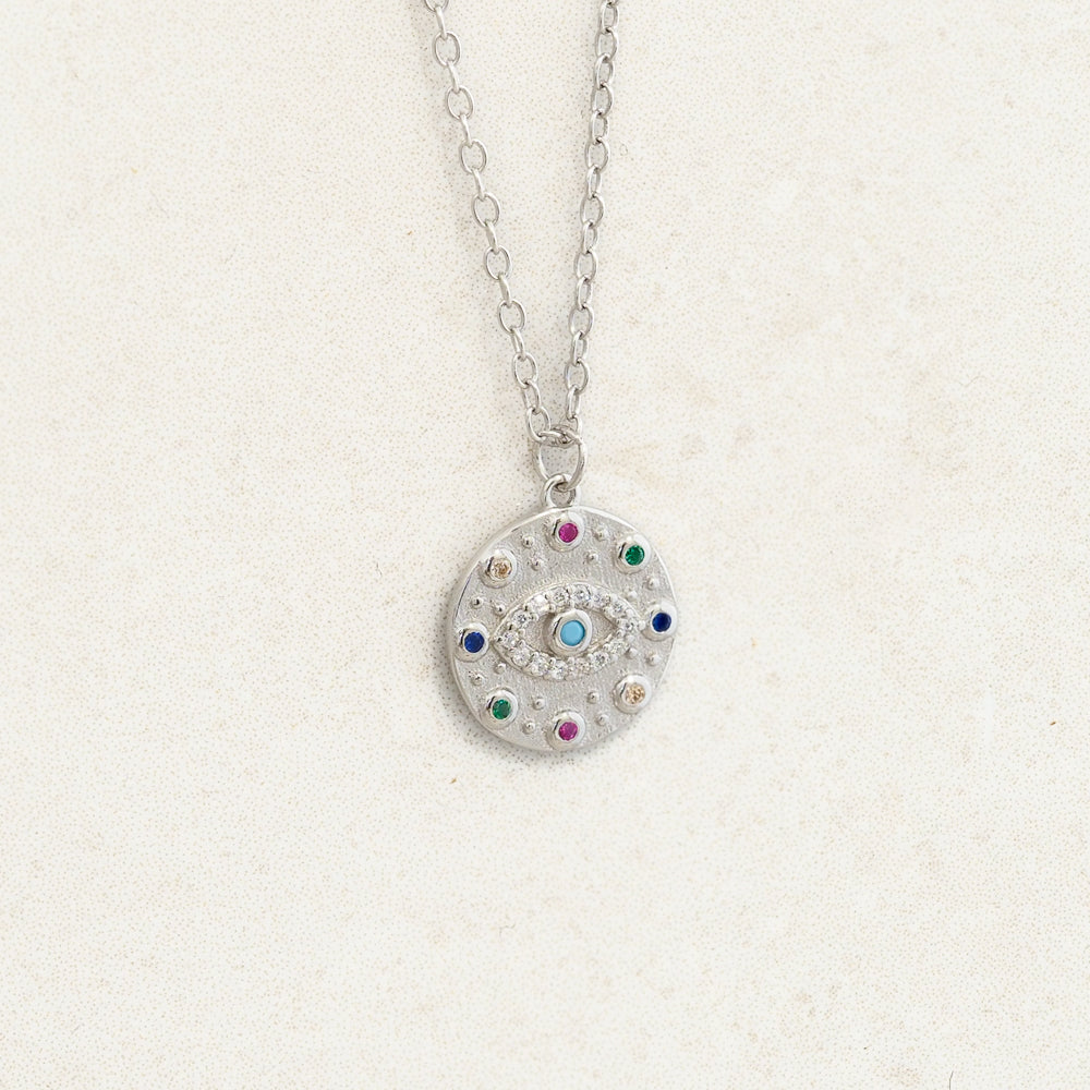 Evil eye and rainbow themed necklace as part of pride jewelry collection - side silver shot