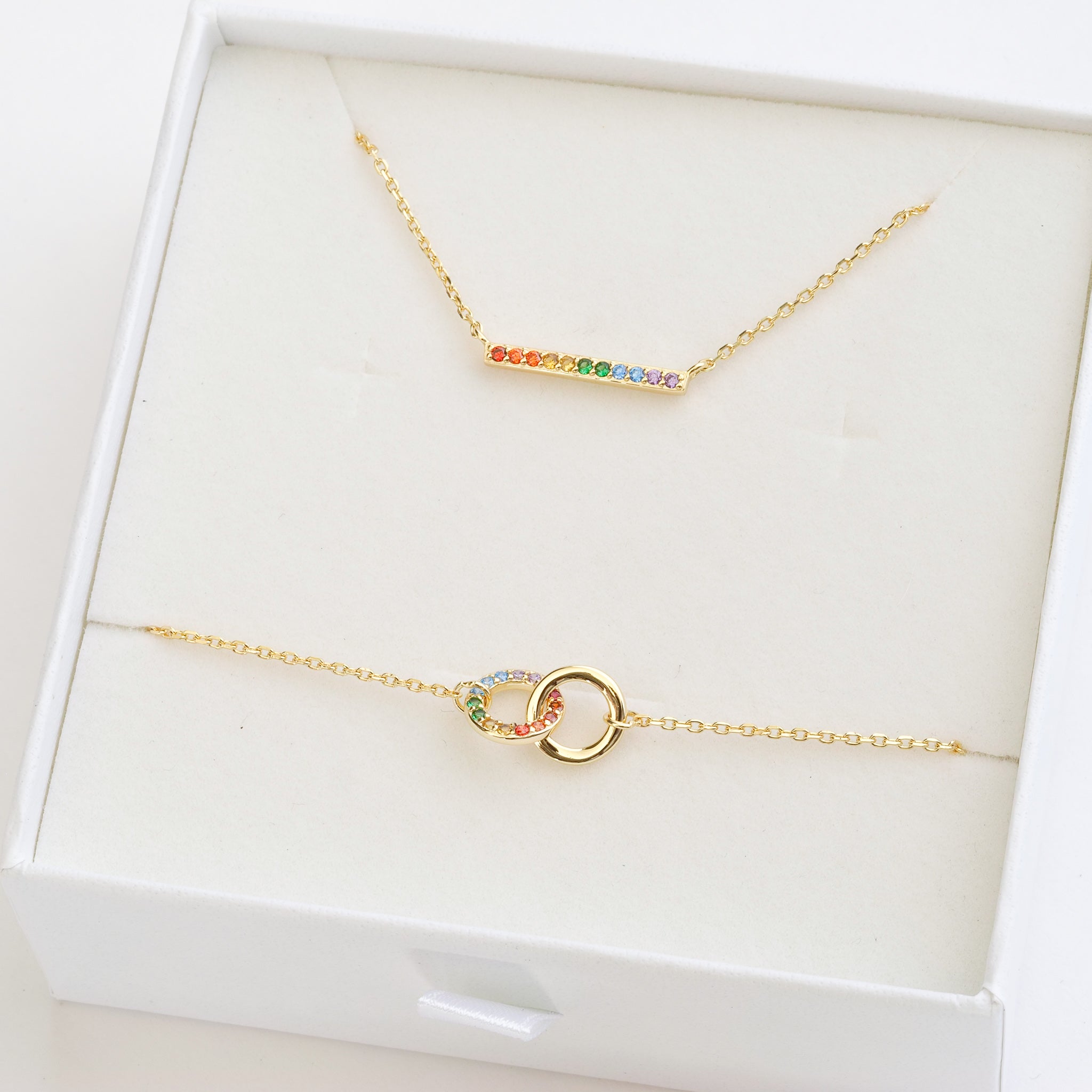 pride flag jewellery set featuring rainbow pride necklace and rainbow pride bracelet perfect as LGBTQI+ gift - gold