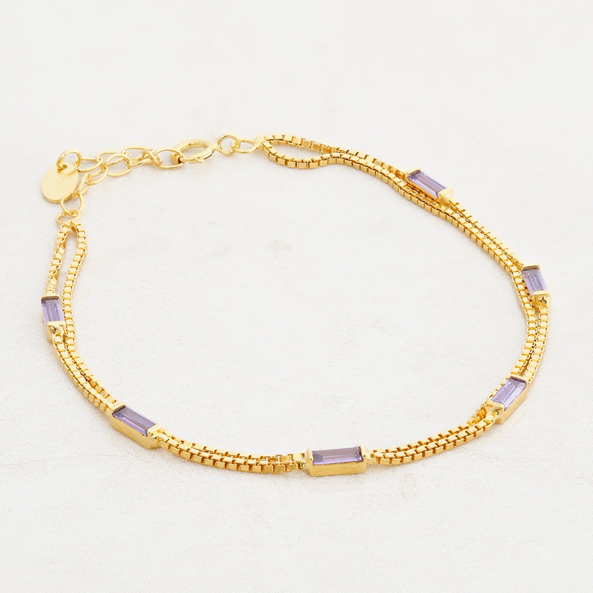 purple and gold bracelet, wear it purple day, pride jewelry, left
